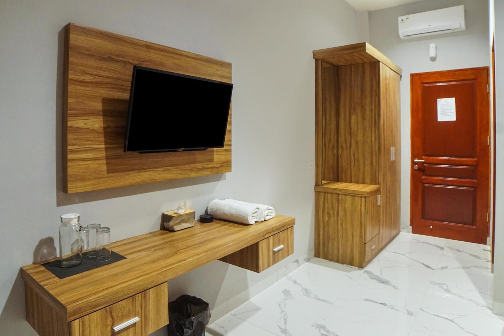 מדאן Super Oyo Capital O 92066 Papakoel Hotel & Cafe מראה חיצוני תמונה